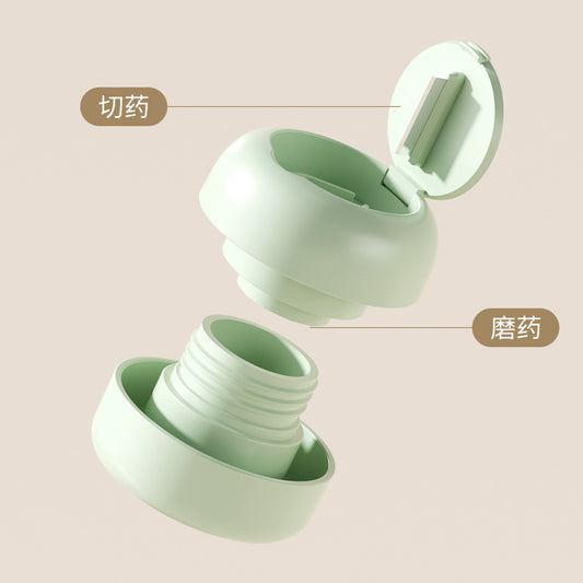 Pill cutter grinder showing green white and blue colour options