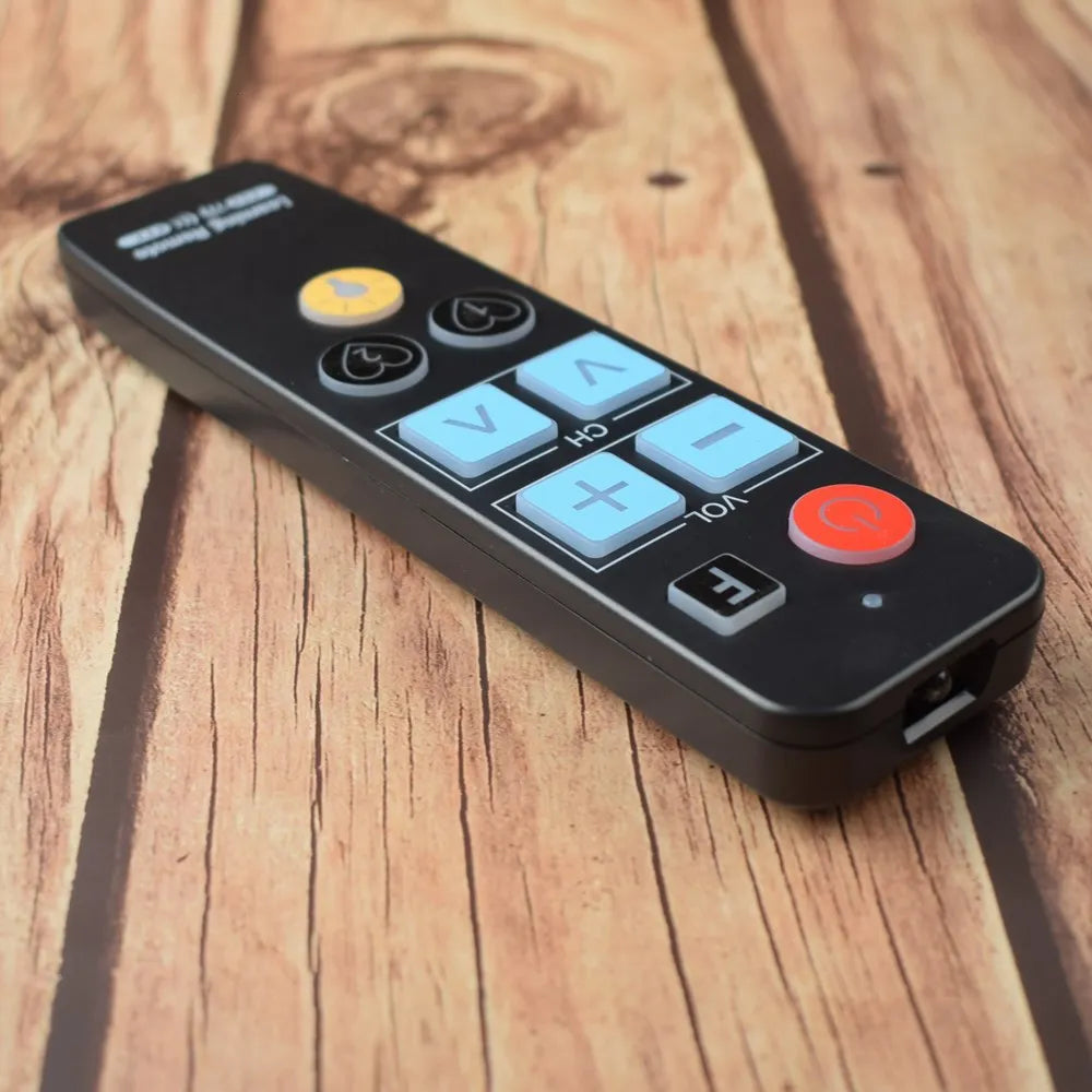 Large button remote showing compatible TV brands — universal remote for elderly use