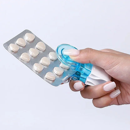 Pill taker used on standard blister pack — no grip needed medication aid for arthritis